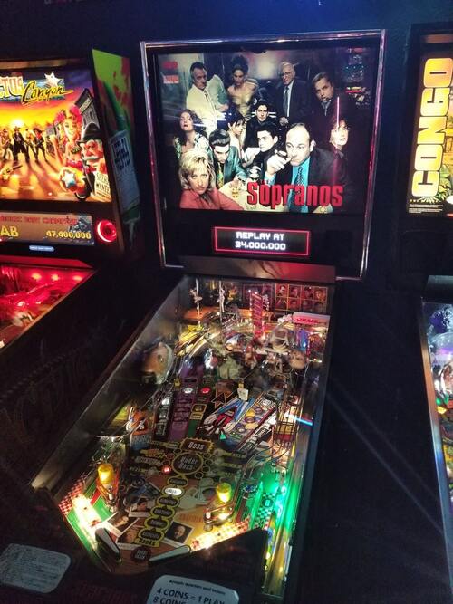 Photo of the pinball machine for Sopranos, by Stern, from the post-crash age of Pinball 