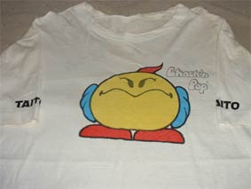 Photo showing the back of a t-shirt that was a prize for a Chack’n Pop high-score contest 